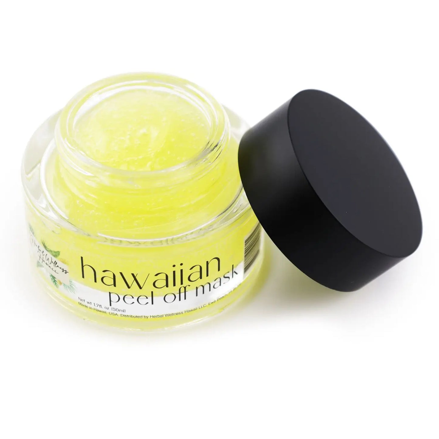 A partly open jar of Black Coral Wax USAs Peel-off Mask features a bright yellow, pH-balanced gel with the black lid leaning on the container. The label showcases floral designs and the product name.