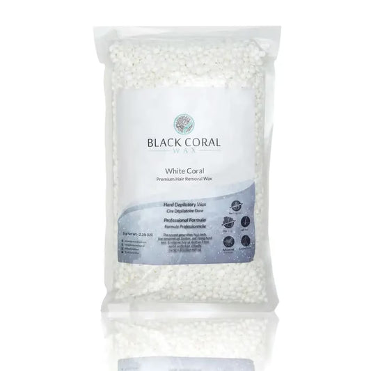 Bag of white wax beads with Black Coral branding on a white background