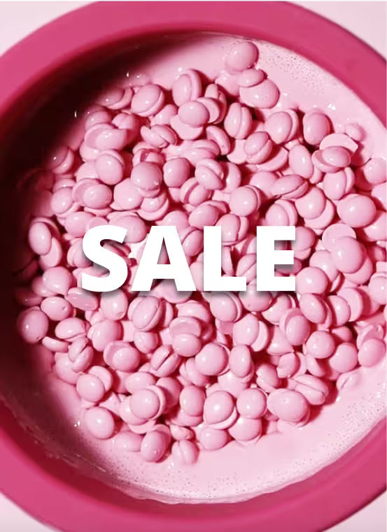 Pink candies in a pink container with 'SALE' text