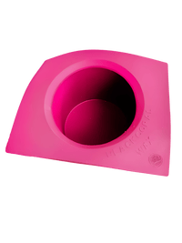A pink, square 5lb Silicone Insert by Black Coral Wax USA features a central circular opening and sits on a white background. The mold’s surface is embossed with BLACK CORAL WAX USA.