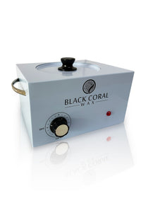 The Black Coral Wax USA 5lb Warmer + FREE Hard Wax is a white electric warmer with a black temperature dial, red indicator light, side handle, and glass lid with black knob.