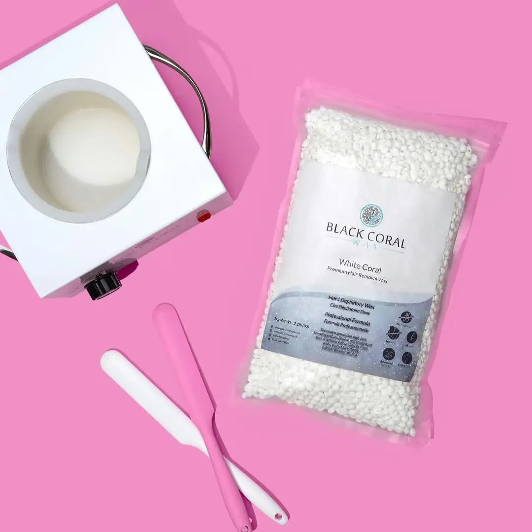 White coral packaging with a small bowl and brush on a pink background