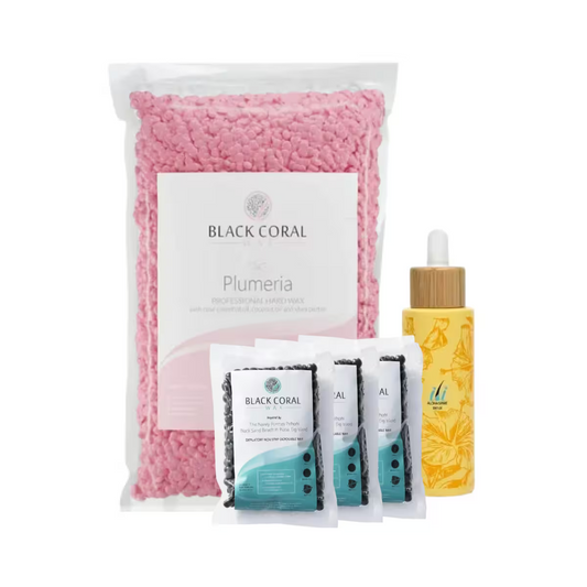 The Face Expert Kit by Black Coral Wax USA includes a large bag of pink wax beads, two pump bottles, a dropper bottle with yellow liquid, and four small packets, each with distinct labels and designs.