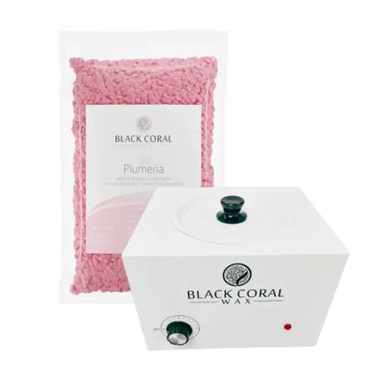 A bag of pink wax beads labeled Busy Pro Waxing Kit by Black Coral Wax USA stands behind a white hard wax warmer with a black lid knob and control dial—ideal for salon hair removal or any professional waxing kit.