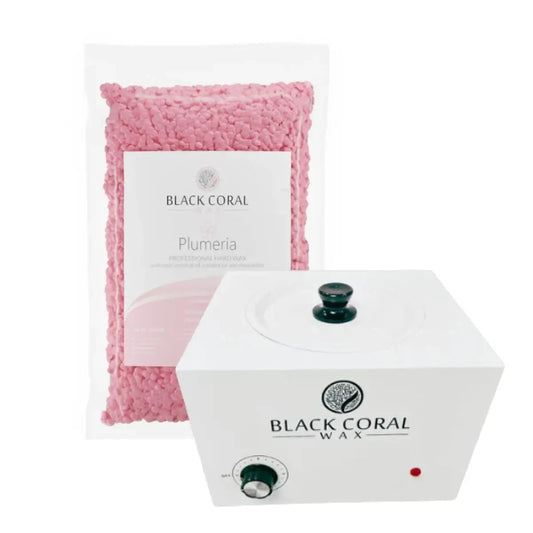 A bag of pink wax beads labeled Busy Pro Waxing Kit by Black Coral Wax USA stands behind a white hard wax warmer with a black lid knob and control dial—ideal for salon hair removal or any professional waxing kit.
