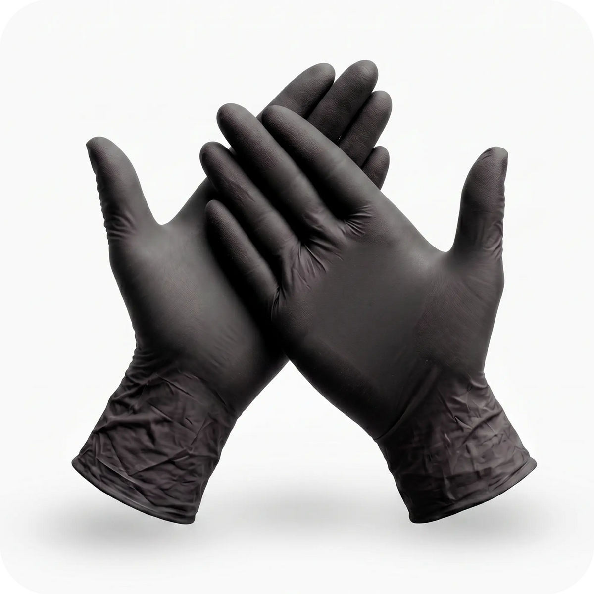 Two hands wearing Black Coral Wax USA Nitrile Gloves 100pcs - Powder-Free & Latex-Free Disposable Gloves are crossed at the wrists against a plain white background.