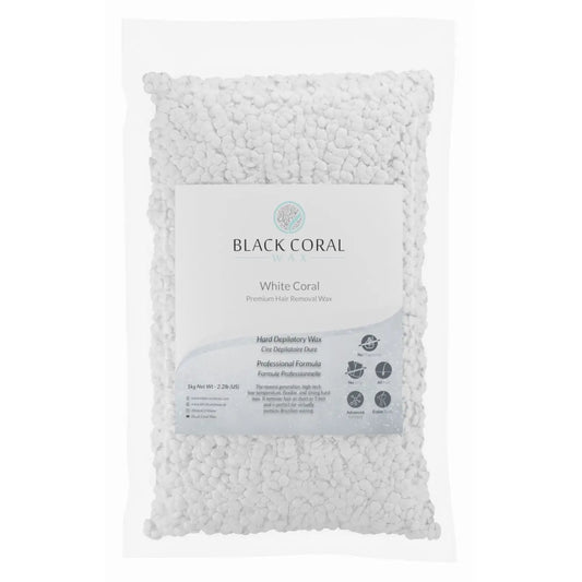 The 5 kg (11 lbs) bag of White Coral Wax by Black Coral Wax USA contains hypoallergenic white wax beads suitable for sensitive skin and is labeled as a professional formula hard depilatory wax.