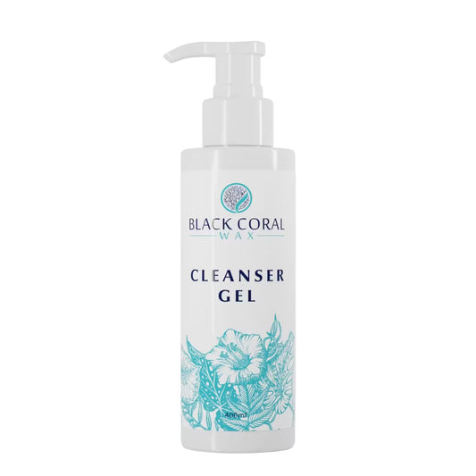 A white pump bottle labeled Cleanser Gel 400ml by Black Coral Wax USA, ideal as a pre-waxing cleanser, features blue floral designs near the base and a blue coral illustration in the logo.