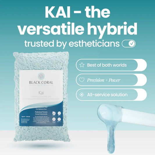 A bag of Kai Hard Wax from Black Coral Wax USA sits by a spatula with blue wax, highlighting this esthetician-trusted stripless wax as a precise, powerful, and versatile all-service hair removal solution.