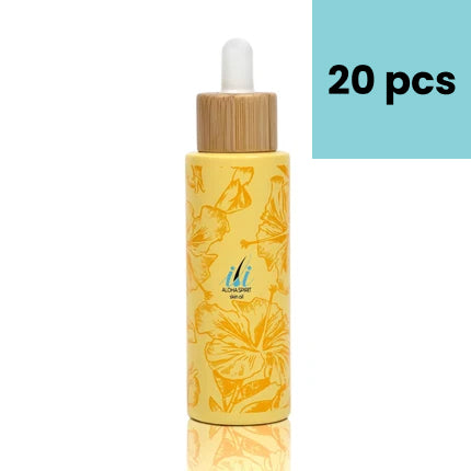 A yellow ili Oil 60ml Ingrown Oil dropper bottle by Black Coral Wax USA, featuring orange floral designs and a wooden cap, stands upright. Ideal for use as a post waxing oil or to moisturize skin after hair removal. “20 pcs” is displayed on a blue background in the top right corner.